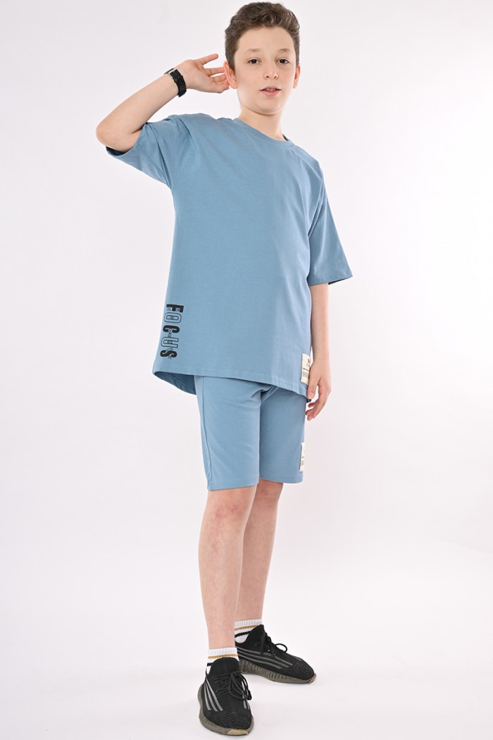 ترنج ولادي اوفر سايز سماوي من Biscoti بسكوتي – فساتين بناتي أنيقة وفخمة