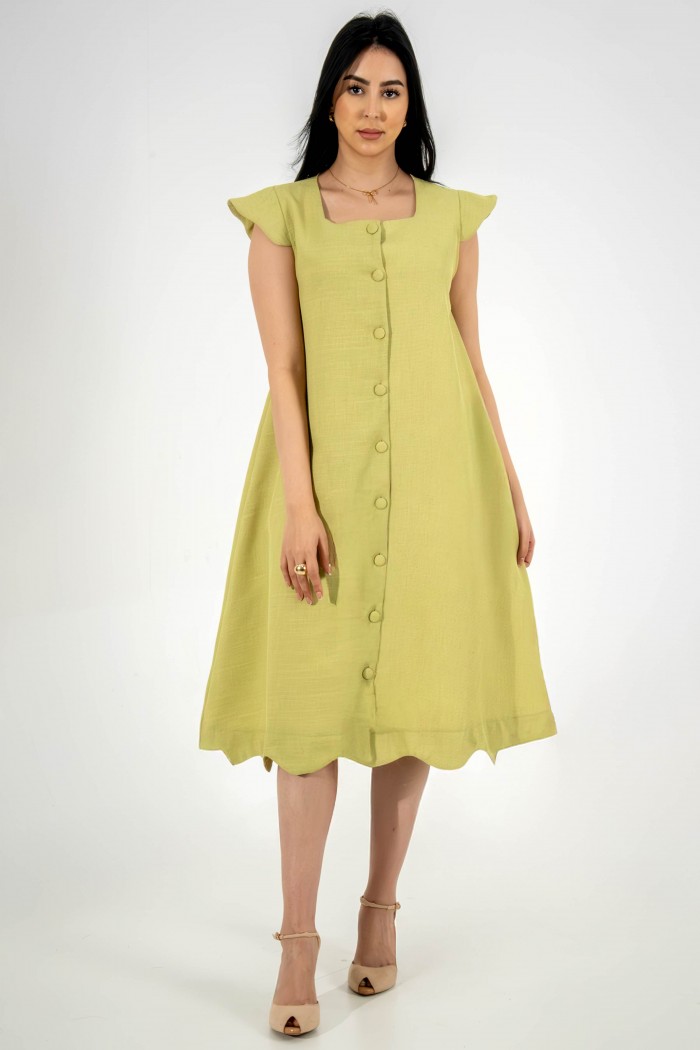 فستان فستقي مع أزرار كاملة ونهايات مموجة AN24059 من Biscoti بسكوتي – فساتين بناتي أنيقة وفخمة