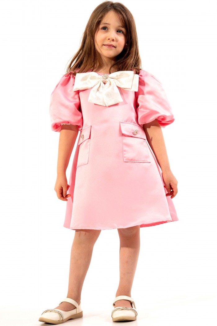 فستان وردي مزين فيونكة بيضاء AN24090 من Biscoti بسكوتي – فساتين بناتي أنيقة وفخمة