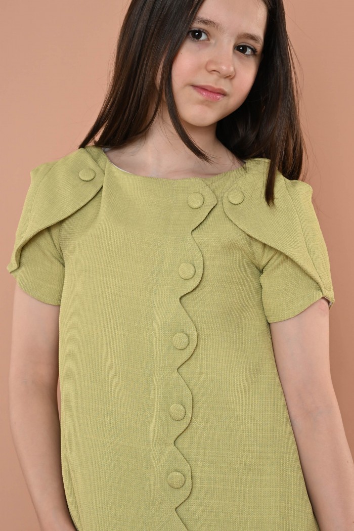 فستان أنيق ذو قصة عصرية باللون الفستقي AN24060G من Biscoti بسكوتي – فساتين بناتي أنيقة وفخمة