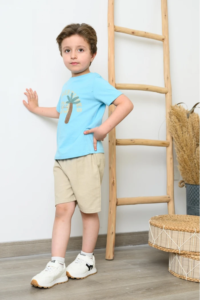 طقم ولادي صيفي أزرق سماوي بطبعة Summer Times مع شورت بيج