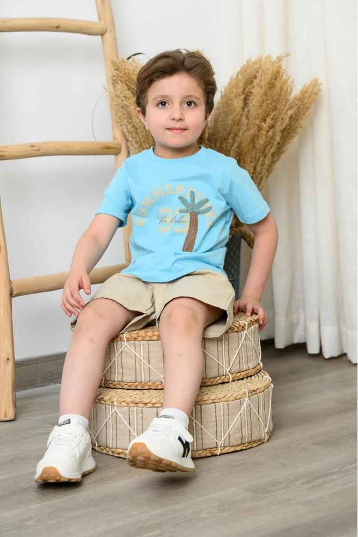 طقم ولادي صيفي أزرق سماوي بطبعة Summer Times مع شورت بيج